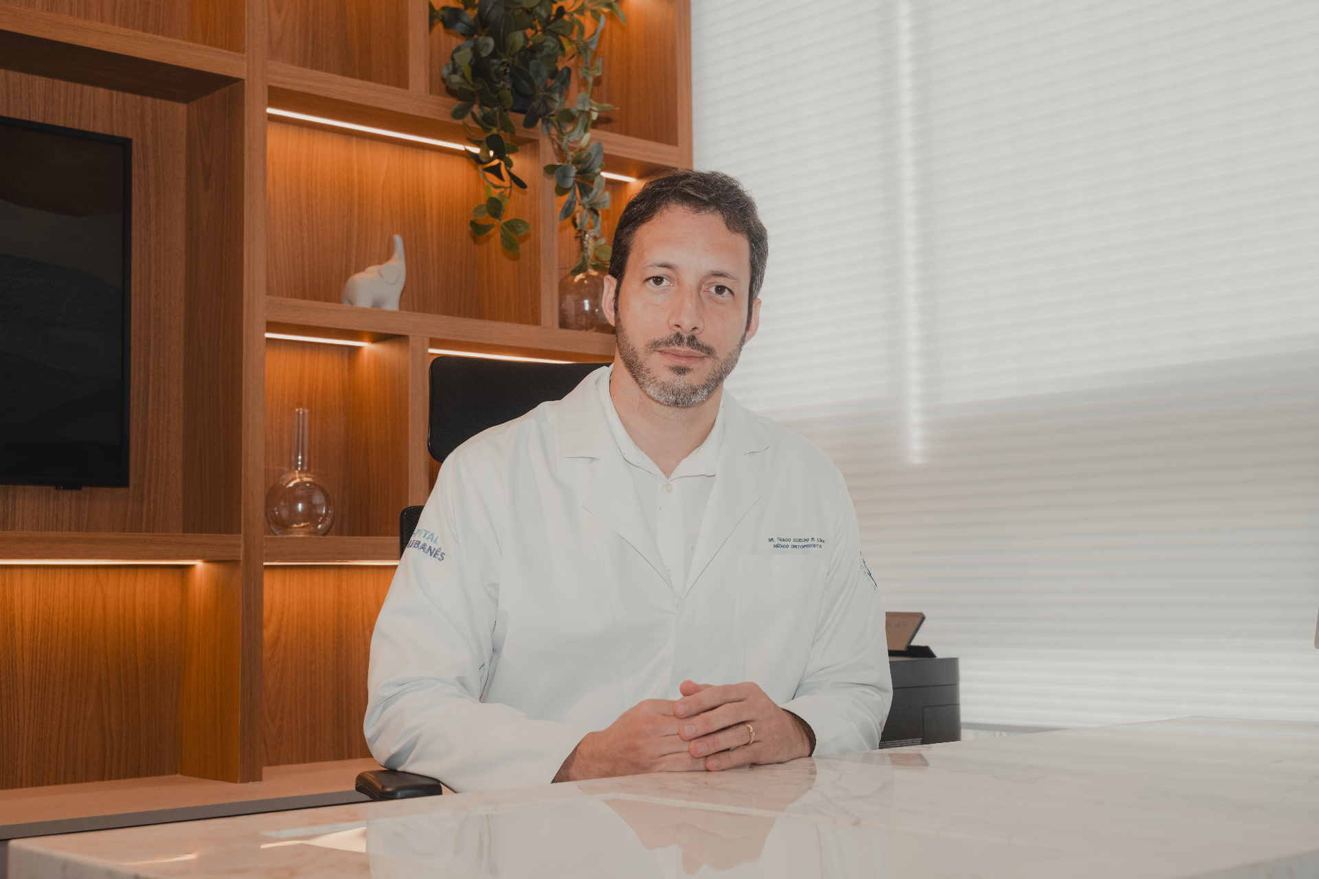 Dr. Thiago Coelho em atendimento